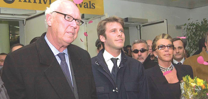 The return of the Savoys: Prince Victor Emmanuel arrives at Naples airport with his wife and son.