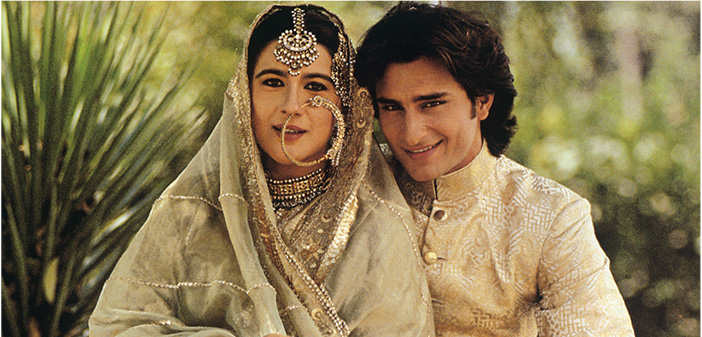 Nawabzada Saif Ali Khan of Pataudi, son of the Nawab of Pataudi, with his wife, Begum Saif Ali Khan. The Nawabzada is wearing a contemporary ‘achkan’ and ‘churidar paijama’, while the Begum is dressed in a traditional three-piece ensemble, probably made in the early twentieth century.